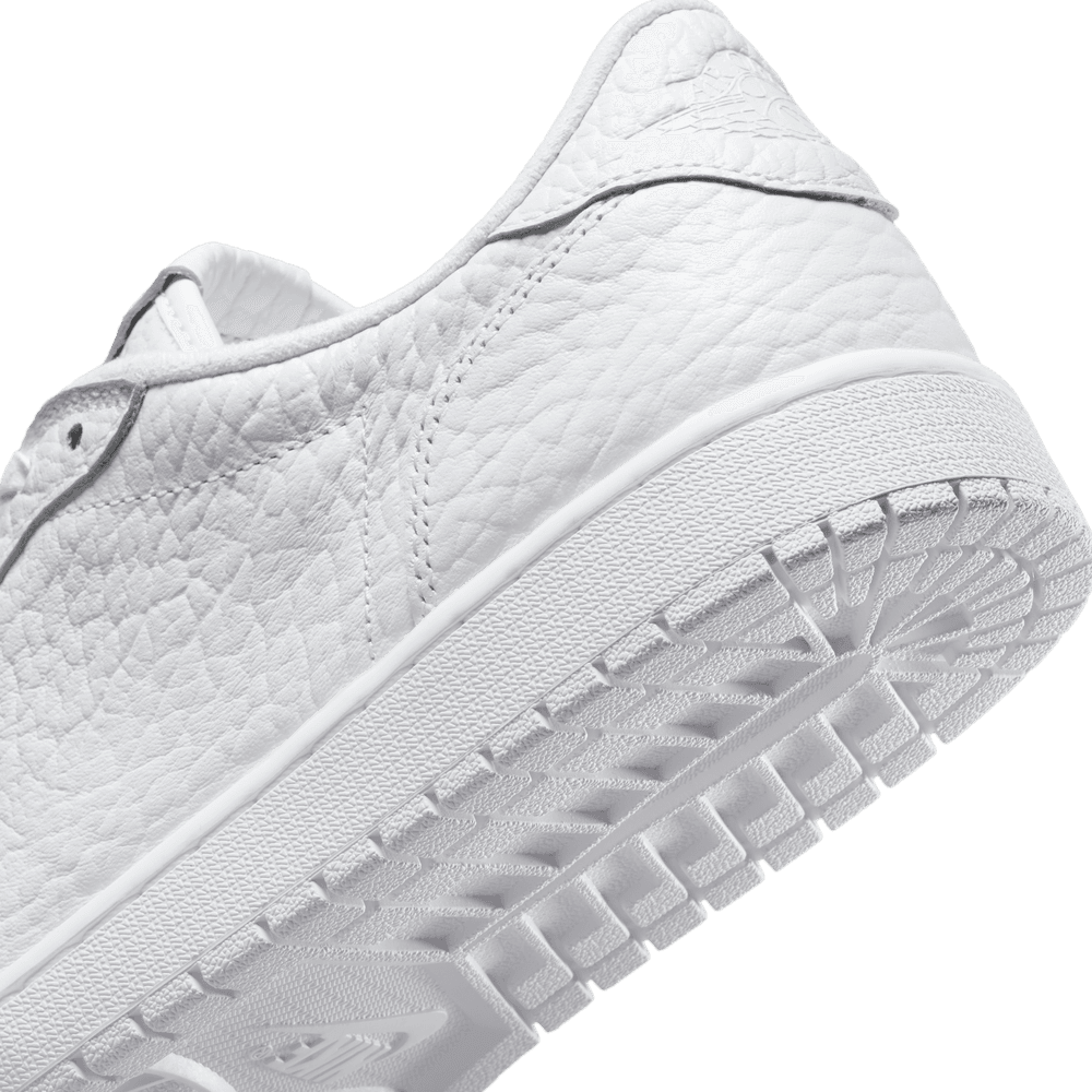 all white jordan low tops